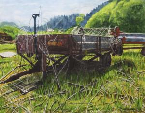山々を背景に農地に置かれた農材の運搬機の絵画